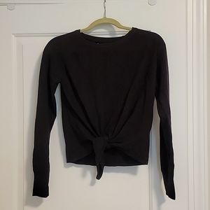 Olivaceous crew neck front knot sweater.